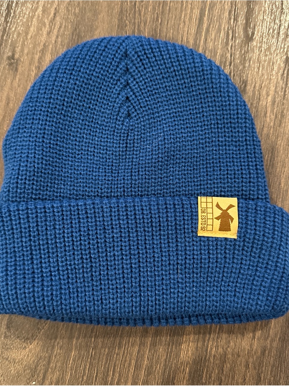 Dutch Bros Blue Knit Beanie with Yellow Windmill Patch